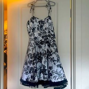 Voodoo Vixen black and white floral dress. Sewn-in black petticoat.